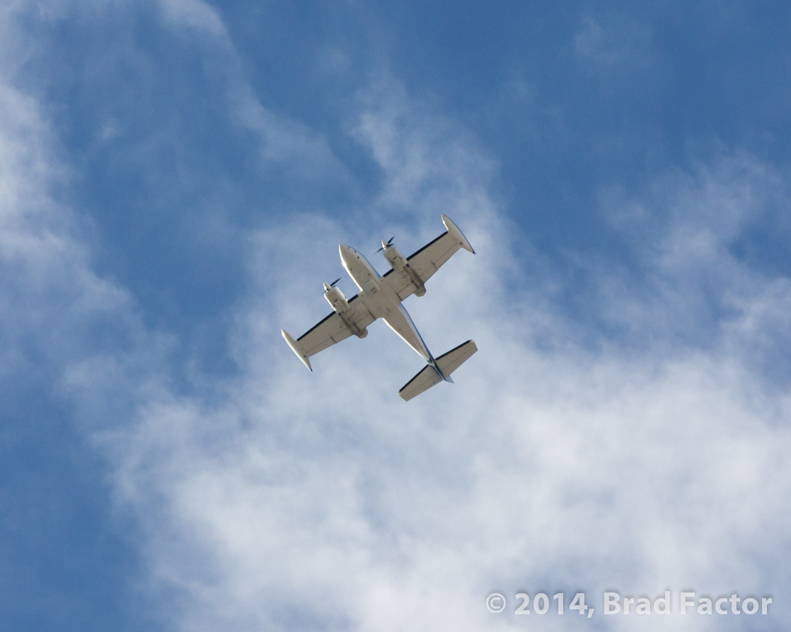 Twin Propeller Aircraft Flyover